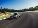 Jízda v Porsche 718 na závodním okruhu, Most